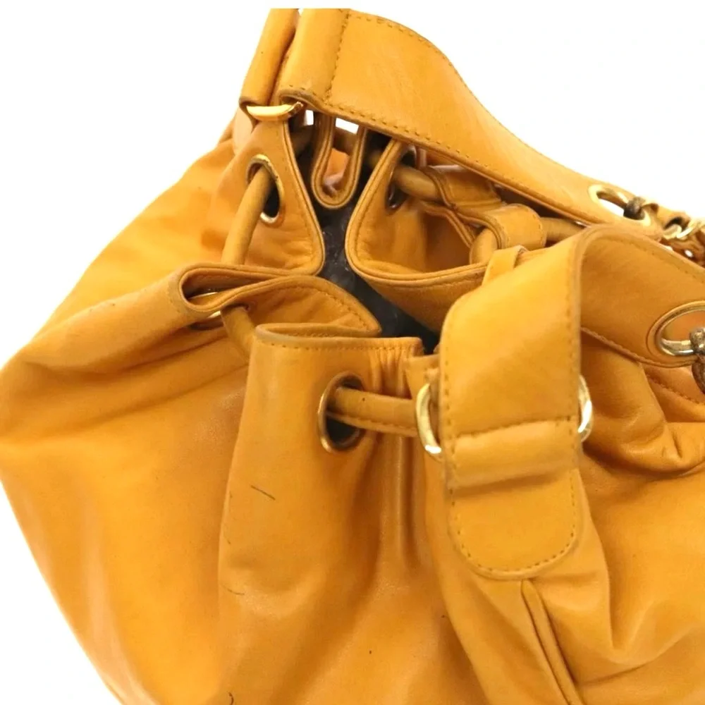 Authentic CHANEL yellow lambskin bucket bag with wallet pouch